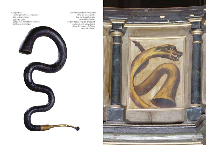 Regarde l'image Serpent d’église. Les six trous permettaient l’exécution de l’échelle chromatique./ Serpent d’église avec tête de serpent  représenté sur le parapet de la tribune des chantres de l’église paroissiale d’Introd.
