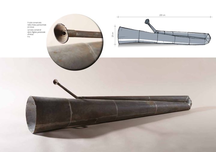 Visualizza immagine Il tubo conservato nella chiesa parrocchiale di Introd./Suonatore di tubo in metallo.